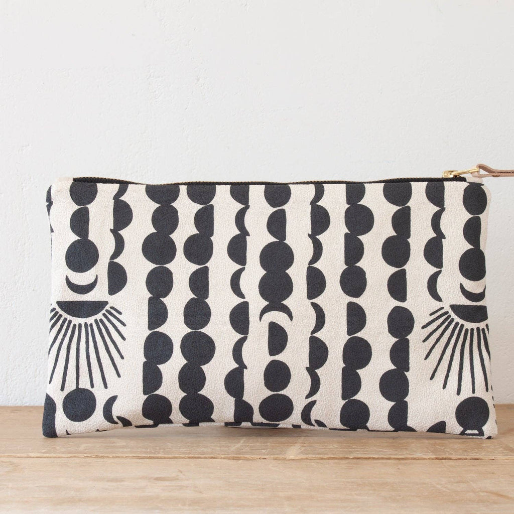 SUN + MOON CLUTCH in worn black-Betina Roza